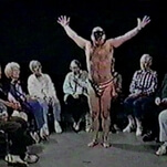 A half-naked masked man dances for old people