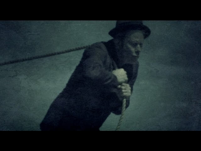 Tom Waits swims with sharks in the new video for "Hell Broke Luce"