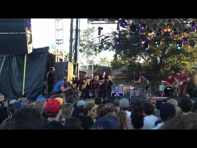 Here is Rooney Mara pretending to play with The Black Lips for Terrence Malick 