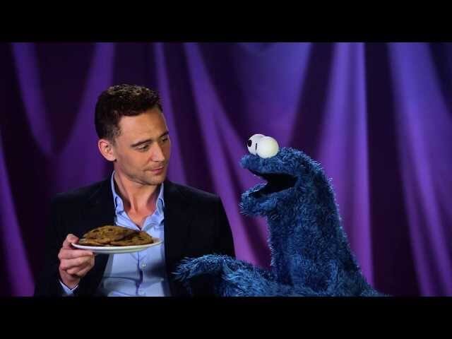 This video of Tom Hiddleston teaching Cookie Monster about delayed gratification is oddly sexual 