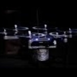 Watch flying drones play music as humanity cowers in terror