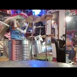 This little puppet mastered Rush’s “Tom Sawyer” on drums, so what’s your excuse?