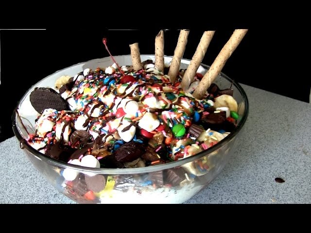 Watch a competitive eater take down a 30 scoop ice cream sundae in 15 minutes