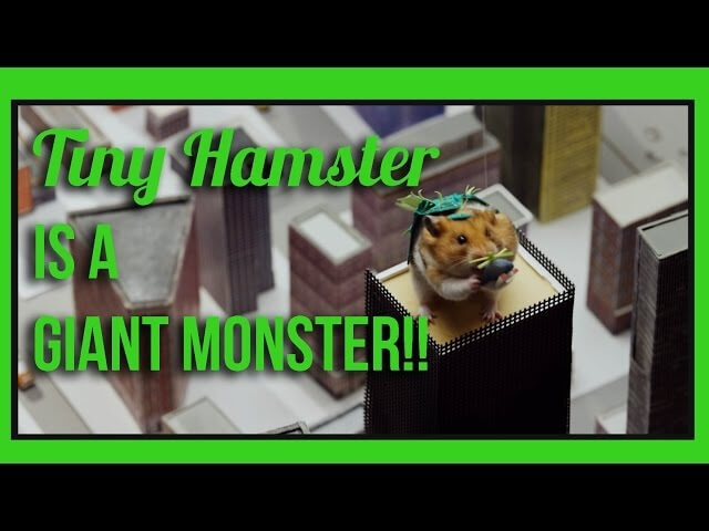 Watch a tiny hamster wreck a tiny city and eat tiny helicopters, Godzilla style