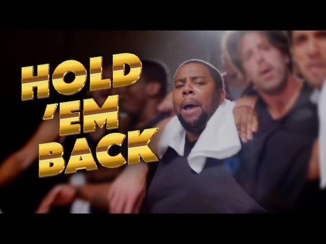 Kenan Thompson holds ’em back in an anthem for basketball benchwarmers