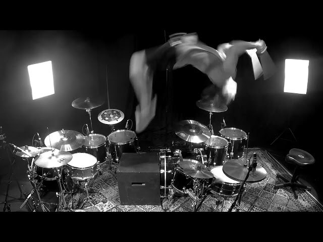 This drummer’s mid-solo backflip is both awesome and unnecessary