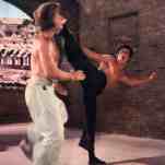 Bruce Lee takes on Chuck Norris, but he makes you wait for the fight