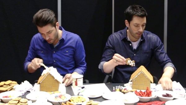 Watch the Property Brothers race to see who can build a better gingerbread house