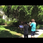 Two young fans serenaded John Williams outside of his house