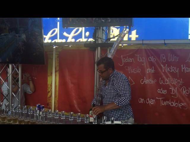 Watch a bartender pour 17 Jägerbombs at once