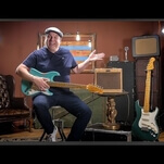 Jeff Garlin shows off a guitar he insists was manufactured by unicorns