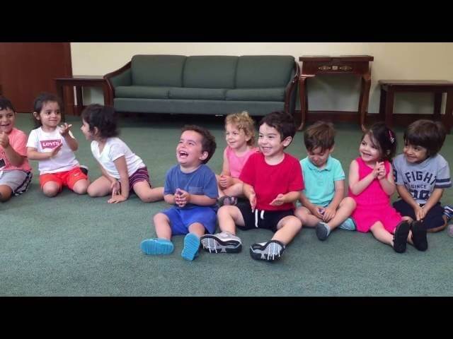 This little boy is having the time of his life clapping to songs