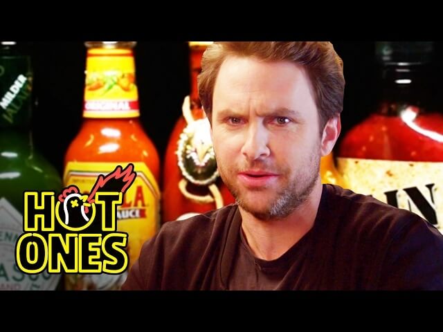 Charlie Day eats a bunch of hot wings, tries not to cry