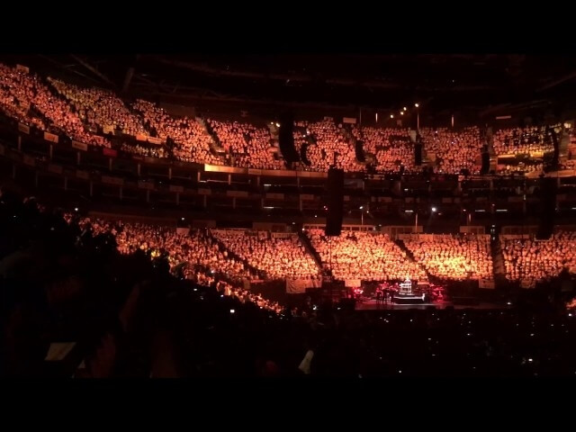 Behold, an arena of children singing They Might Be Giants’ “Birdhouse In Your Soul”