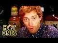 Watch Thomas Middleditch ham it up while eating wings