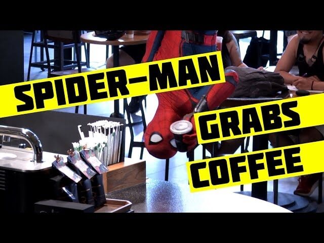 Spider-Man drops in on some Starbucks customers