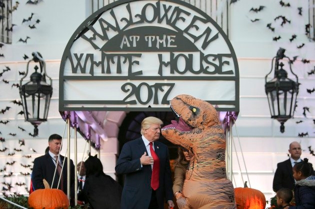 Dinosaur costume strikes terror into heart of world leader