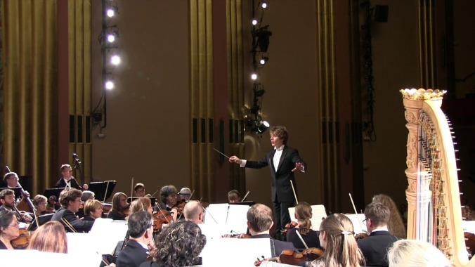 Watch (and listen) to a woman supplying an accompanying scream at the orchestra