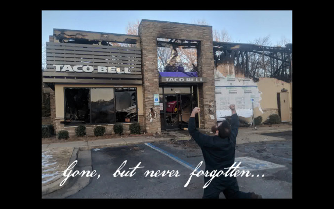 Solemn candlelight vigil held for a burned-down Taco Bell