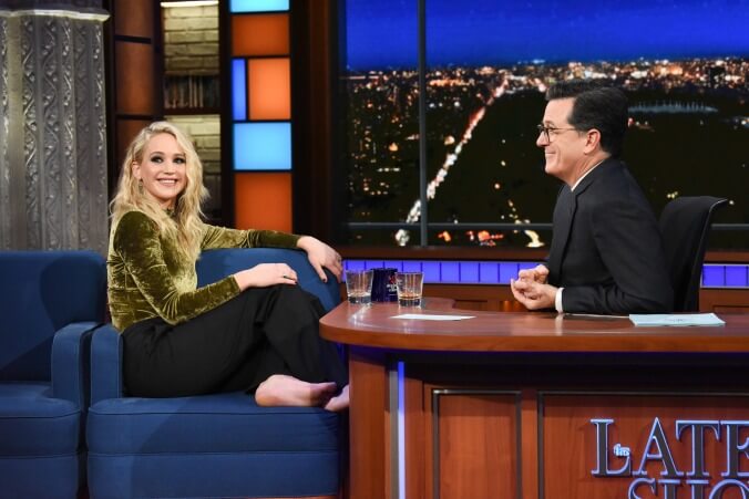 Stephen Colbert breaks out the rum for a wild, shoeless interview with Jennifer Lawrence