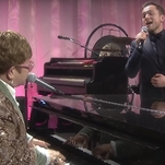 Come watch Elton John perform "Tiny Dancer" alongside his shadow self, Rocketman's Taron Egerton