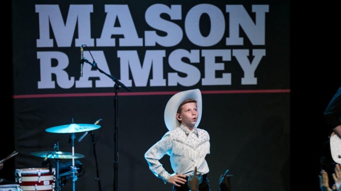 Yodelin’ Walmart boy cuts loose, crowd-surfs on an inflatable horse