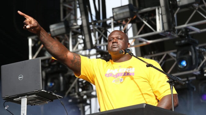 Our apologies to anyone who had to stand behind Shaq at this EDM festival