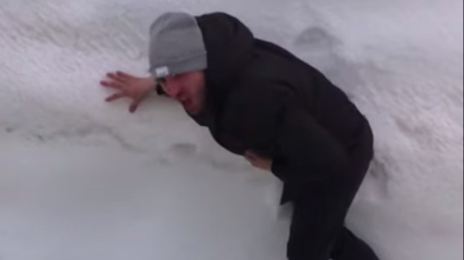 Australian man tries to fly, eats shit on an ice-covered snowbank instead