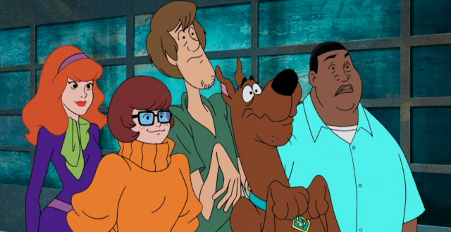 Zoinks, Kenan Thompson hangs with Mystery Incorporated in this exclusive Scooby Doo And Guess Who? clip