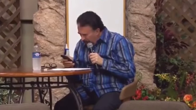 This preacher browsing his phone while speaking in tongues speaks volumes