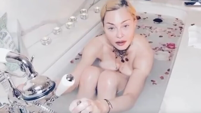 Madonna deletes post calling coronavirus a "great equalizer" from bathtub filled with rose petals