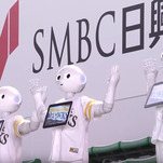 Bow before the unblinking gaze of these dumb-looking robot cheerleaders