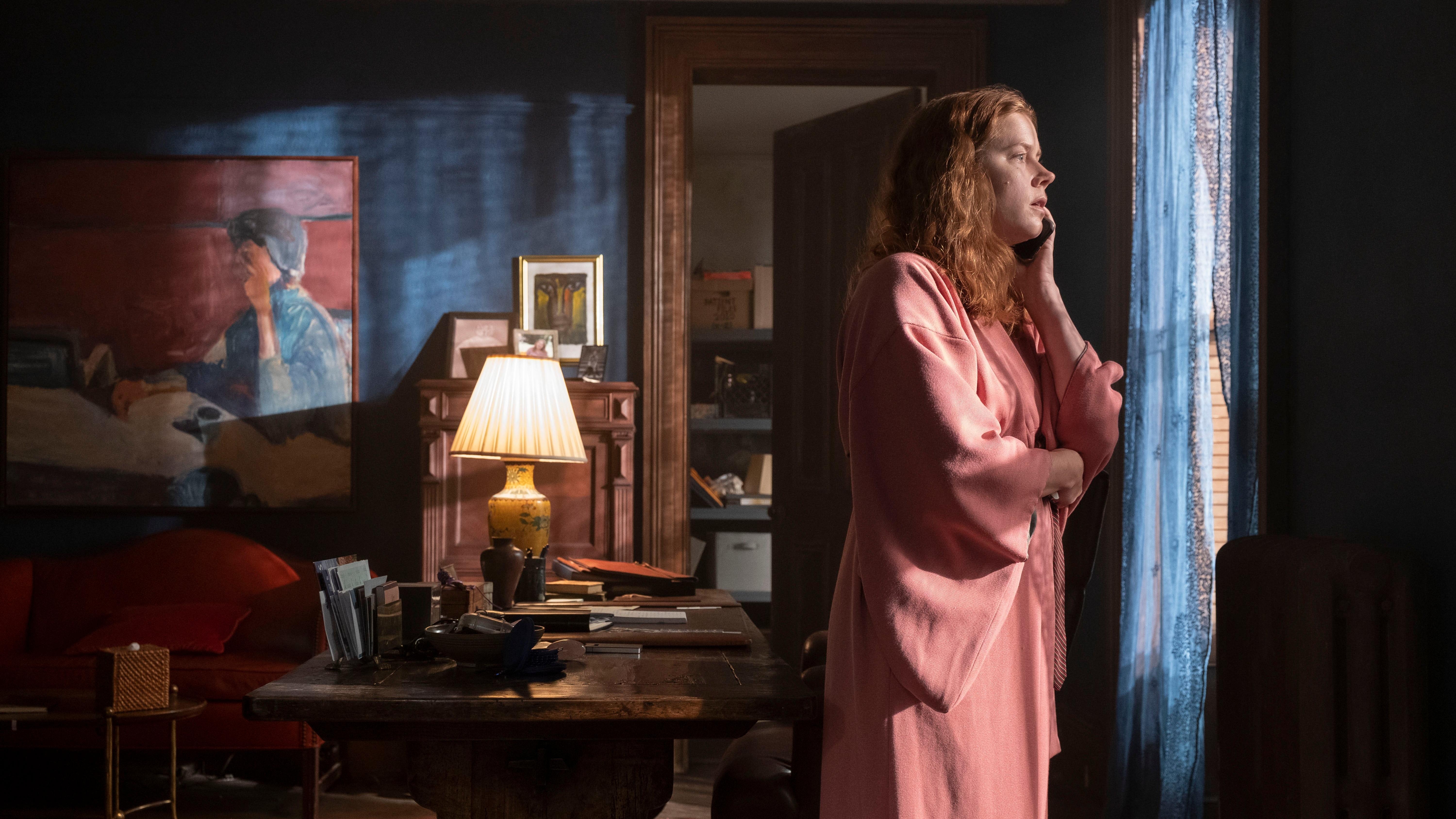 Amy Adams spies a convoluted Rear Window mystery in The Woman In The Window