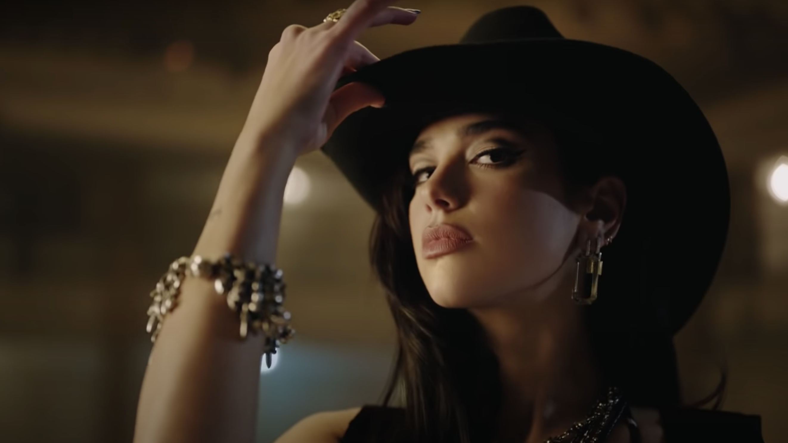 Dua Lipa saddles up for "Love Again" music video