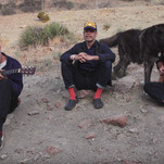 Matt Sweeney and Bonnie "Prince" Billy perform a Superwolves track for an audience of regular wolves