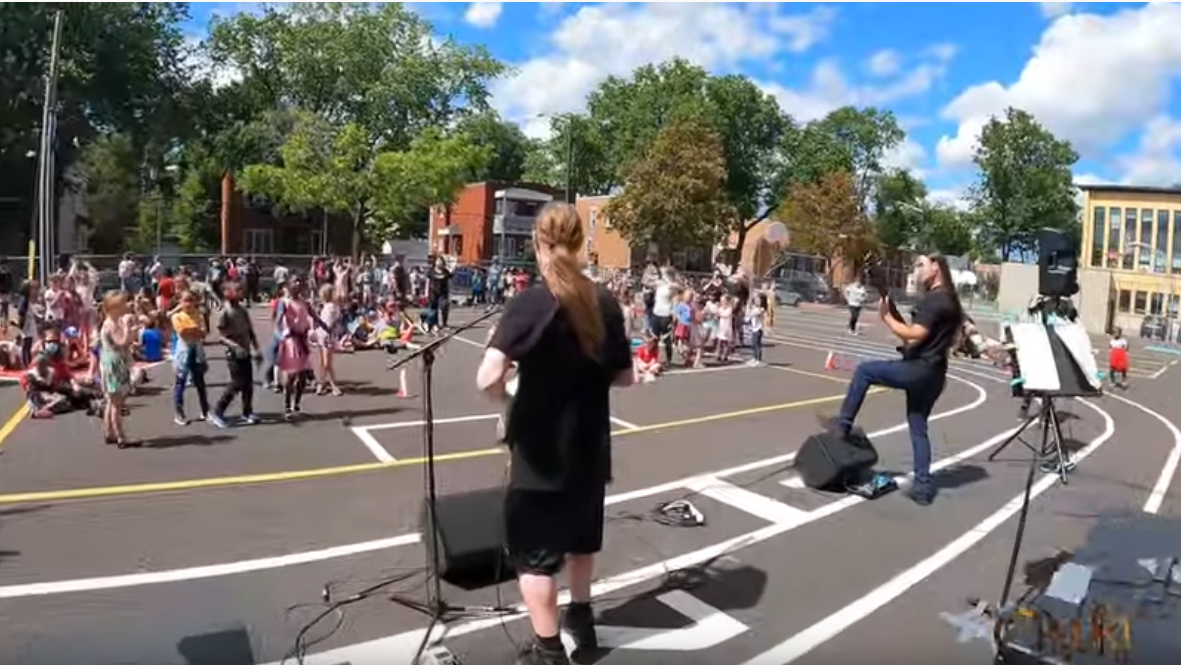 Metal band welcomes audience of elementary school students to sonic landscape of eternal darkness