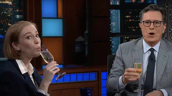 Stephen Colbert toasts Hacks star Hannah Einbinder's Late Show return with apology champagne, socks