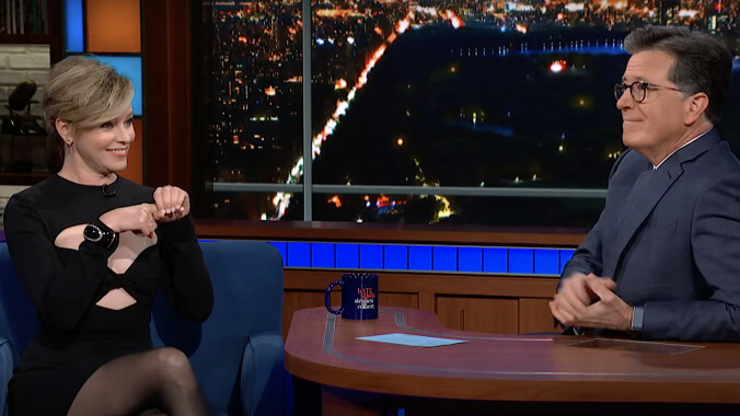 New sex ed podcaster Elizabeth Banks toasts the clitoris with Stephen Colbert