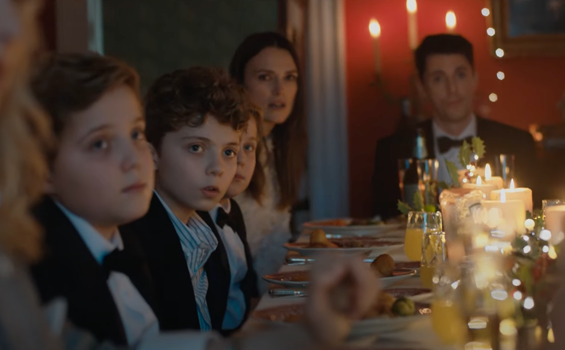 Keira Knightley and Matthew Goode anticipate the end of the world with an epic Christmas bash in Silent Night trailer