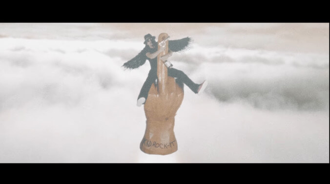 Conceptual artist Kid Rock soars to Mars on a giant middle finger