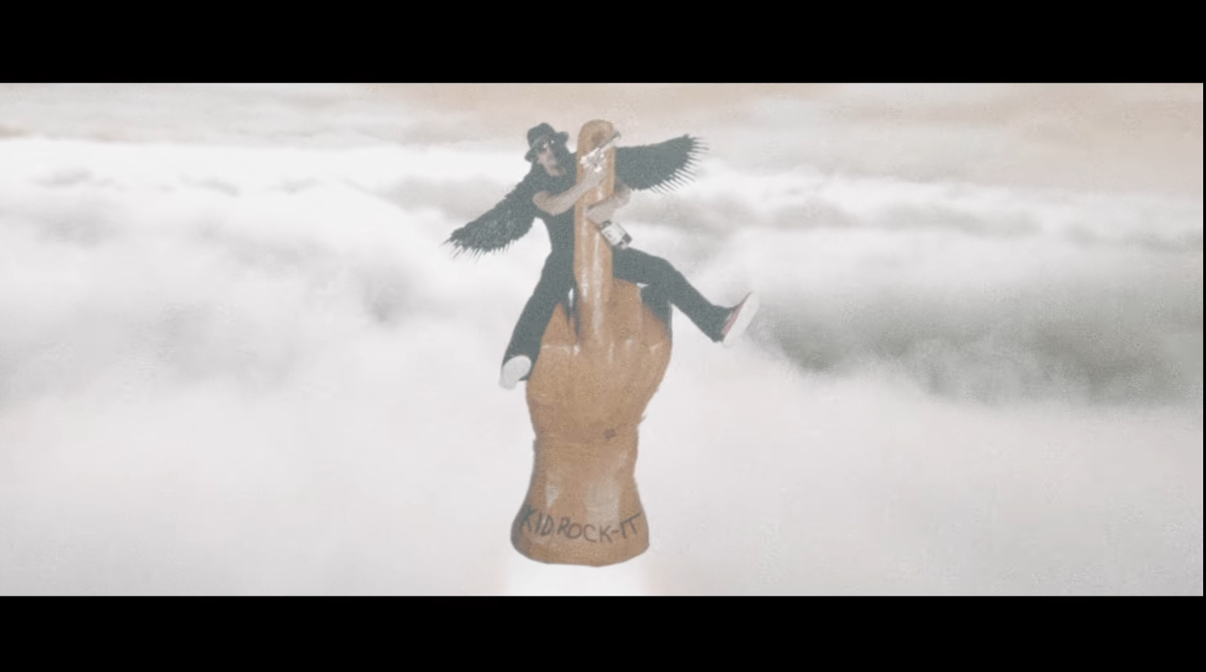 Conceptual artist Kid Rock soars to Mars on a giant middle finger