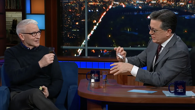 Anderson Cooper does shots with Stephen Colbert while discussing Chris Cuomo's firing