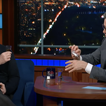 Anderson Cooper does shots with Stephen Colbert while discussing Chris Cuomo's firing