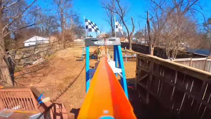 Oh, to be a little toy car enjoying a very elaborate Hot Wheels backyard racetrack