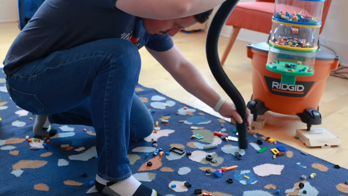 Genius inventor makes The Office‘s vacuum toy collector a reality, uses it to suck up and sort Lego