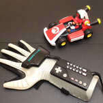 Tech modder figures he might as well rig up a Nintendo Power Glove to his Switch and play Mario Kart