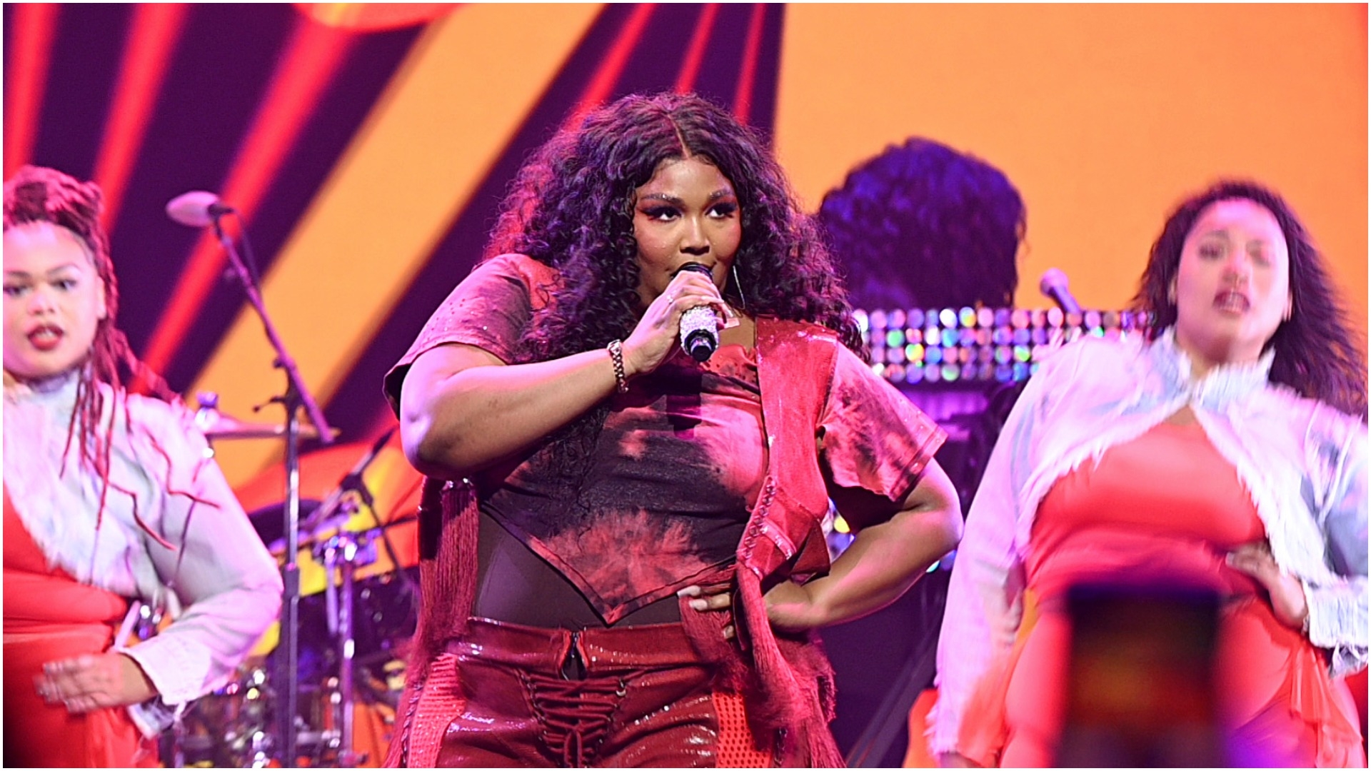 Lizzo removes “harmful” word from her new song “Grrrls” following ableism criticism