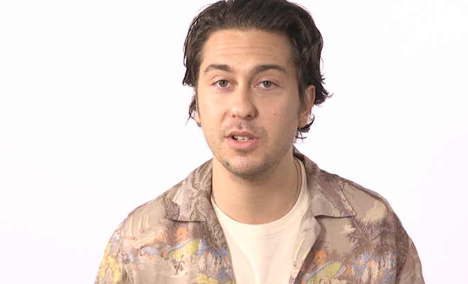 The Consultant star Nat Wolff on Christoph Waltz, playing music, and almost landing Spider-Man