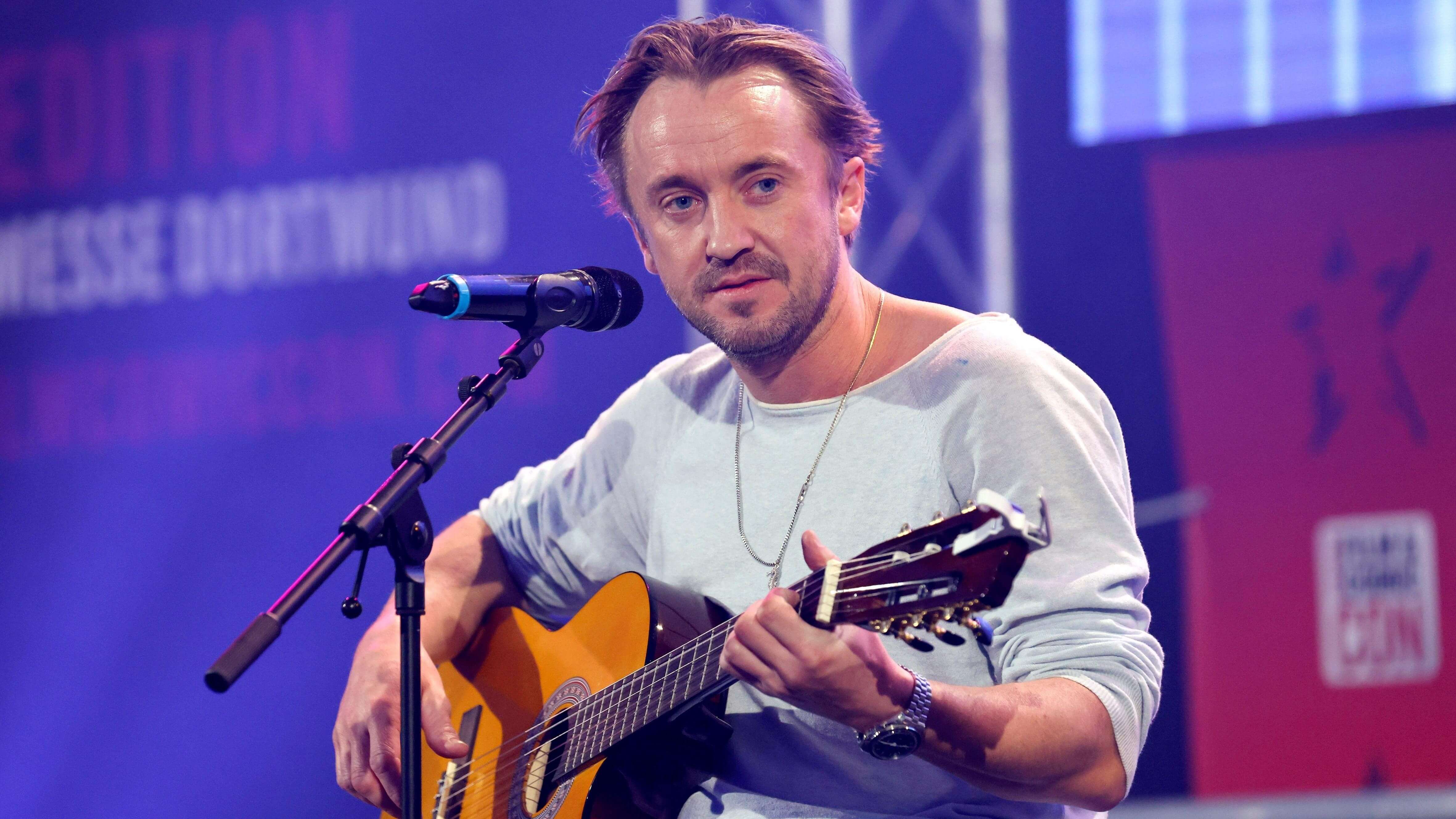 Tom Felton is playing Gandhi’s vegetarian friend, releasing new music, and still talking about Harry Potter