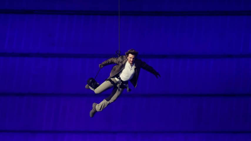 Tom Cruise closes Olympics the only way he knows how (by jumping off a building)